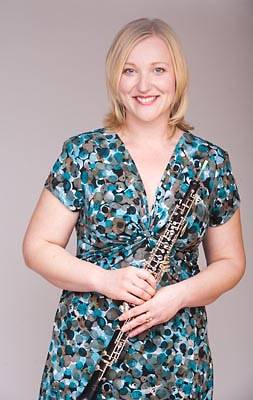 Dr. Marlena Vavrikova holding an oboe